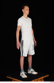  Johnny Reed dressed grey shorts sneakers sports standing white t shirt whole body 0008.jpg